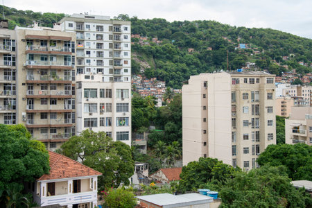 social contrast in an urban area of the city of Rio de Janeiro, showing middle-class buildings in...