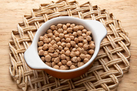 jar with grain - raw ingredient for preparing dishes - chickpeaの写真素材