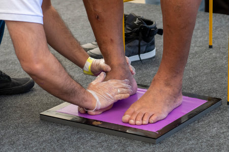 Rio, Brazil - July 24, 2021: Soccer player Adriano puts his foot print at the Maracana stadium hall off fameのeditorial素材