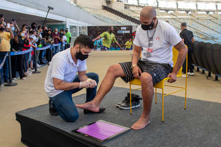Rio, Brazil - July 24, 2021: Soccer player Adriano puts his foot print at the Maracana stadium hall off fameのeditorial素材
