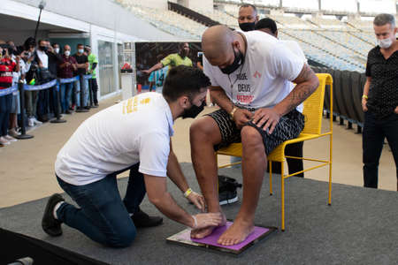 Rio, Brazil - July 24, 2021: Soccer player Adriano puts his foot print at the Maracana stadium hall of fameのeditorial素材
