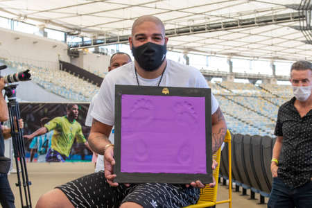 Rio, Brazil - July 24, 2021: Soccer player Adriano puts his foot print at the Maracana stadium hall of fameのeditorial素材