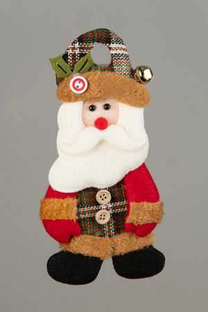 Bear-shaped rag doll used to decorate Christmas treeの写真素材