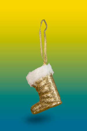 yellow Santa Claus boot used to decorate Christmas treeの写真素材