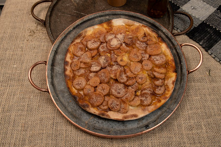 Sweet Brazilian pizza with banana, cinnamon and sugar, top viewの写真素材
