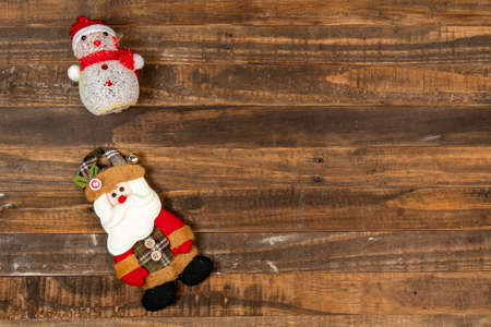 Felt Santa Claus doll, dressed in winter clothes and a snowsuit,の写真素材