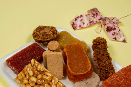 typical Brazilian sweets eaten at the June parties (Festa Junina) and on the day of Sao Cosme e Damiaoの写真素材
