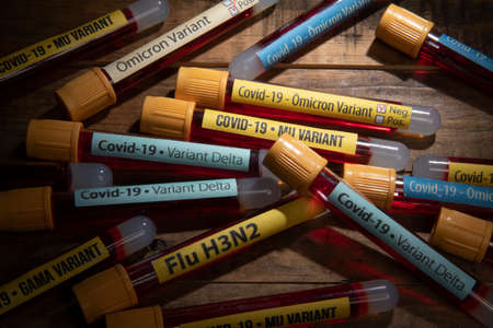 blood collection tubes with labels of different coronavirus variantsの写真素材