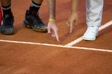 Rio, Brazil - February 12, 2022: referee and player discuss whether the ball went in or out of line in qualifying round match at Rio Open 2022 at Jockey Club Arena, ATP 500 tournamentのeditorial素材