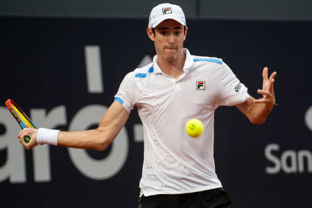 Rio, Brazil - February 12, 2022: [WC] Gustavo Heide (BRA) plays against Miomir Kecmanovic (SRB) in qualifying round match at Rio Open 2022 at Jockey Club Arena, ATP 500 tournamentのeditorial素材