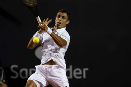 Rio, Brazil - February 15, 2022: Thiago Monteiro (BRA) plays against Sebastian Baez (ARG) in match at Rio Open 2022 at Jockey Club Arena, ATP 500 tournamentのeditorial素材