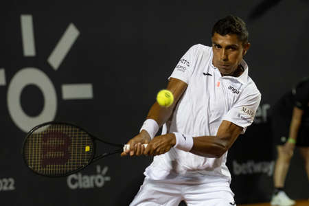 Rio, Brazil - February 15, 2022: Thiago Monteiro (BRA) plays against Sebastian Baez (ARG) in match at Rio Open 2022 at Jockey Club Arena, ATP 500 tournamentのeditorial素材