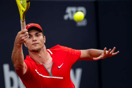 Rio, Brazil - February 13, 2022: Miomir Kecmanovic (SRB) plays against Hugo Dellien (BOL) in qualifying round match at Rio Open 2022 at Jockey Club Arena, ATP 500 tournamentのeditorial素材