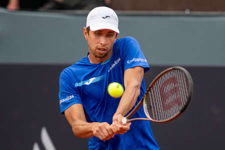 Rio, Brazil - February 13, 2022: Daniel Elahi Galan (COL) plays against [WC] Matheus Pucinelli de Almeida (BRA) in qualifying round match at Rio Open 2022 at Jockey Club Arena, ATP 500 tournamentのeditorial素材