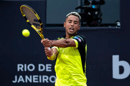 Rio, Brazil - February 13, 2022: Hugo Dellien (BOL) plays against Miomir Kecmanovic (SRB) in qualifying round match at Rio Open 2022 at Jockey Club Arena, ATP 500 tournamentのeditorial素材