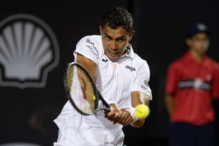 Rio, Brazil - February 15, 2022: Thiago Monteiro (BRA) plays against Sebastian Baez (ARG) in match at Rio Open 2022 at Jockey Club Arena, ATP 500 tournamentのeditorial素材