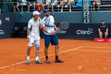 Rio, Brazil - February 20, 2022: Santiago Gonzalez (MEX), Andres Molteni (ARG) in match at Rio Open 2022 at Jockey Club Arena, ATP 500 tournamentのeditorial素材