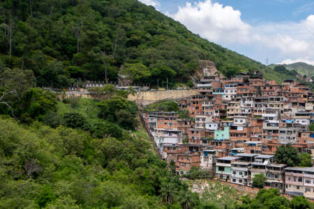 Rio, Brazil - November 14, 2021: View of a poor community on a hillside in the north of the city, showing the nearby vegetationのeditorial素材
