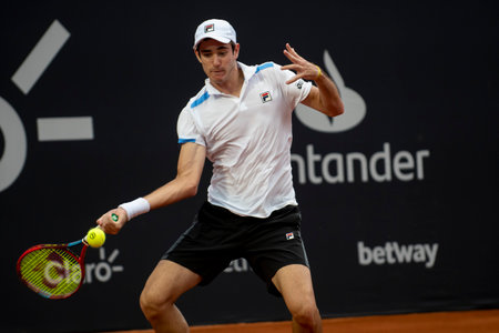 Rio, Brazil - February 12, 2022: [WC] Gustavo Heide (BRA) plays against Miomir Kecmanovic (SRB) in qualifying round match at Rio Open 2022 at Jockey Club Arena, ATP 500 tournamentのeditorial素材