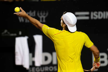 Rio, Brazil - February 12, 2022: Thiago Seyboth Wild (BRA) plays against Roberto Carballes Baena (ESP) in qualifying round match at Rio Open 2022 at Jockey Club Arena, ATP 500 tournamentのeditorial素材