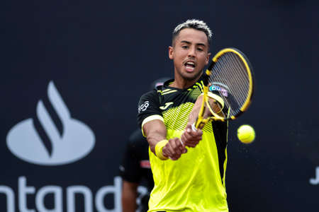 Rio, Brazil - February 13, 2022: Hugo Dellien (BOL) plays against Miomir Kecmanovic (SRB) in qualifying round match at Rio Open 2022 at Jockey Club Arena, ATP 500 tournamentのeditorial素材