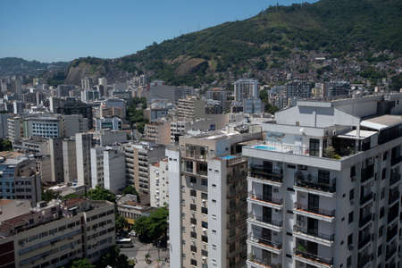 Rio, Brazil - March 10, 2022: view of a densely populated urban area with commercial buildings and residences with a hill in the background, in the Tijuca districtのeditorial素材