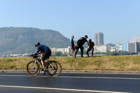 Rio de Janeiro, Brazil - March 13, 2022: policeman arresting and handcuffing a person in Botafogo coveのeditorial素材