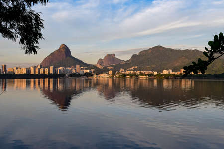 View of Rodrigo de Freitas Lagoon at dawn with Dois Irmao Hill and Pedra da Gavea in the backgroundの写真素材