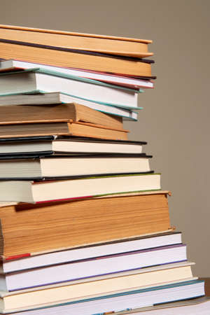 Close-up of background stack of old used books. Pile of vintage old books. Back to school. copy spaceの写真素材