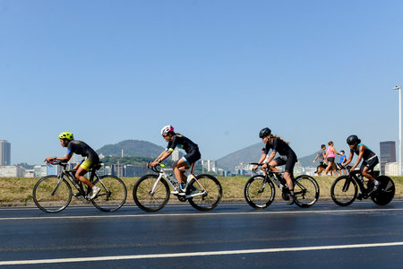 Rio, Brazil - March 13, 2022: athletes participate in a cycling race on the edge of the city, in the bay of Botafogoのeditorial素材