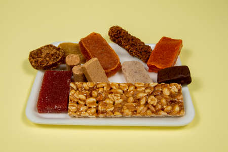 typical Brazilian sweets eaten at the June parties (Festa Junina) and on the day of SÃ£o Cosme e DamiÃ£oの写真素材