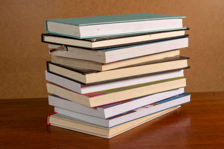 Close-up of background stack of old used books. Pile of vintage old books. Back to school. copy spaceの写真素材