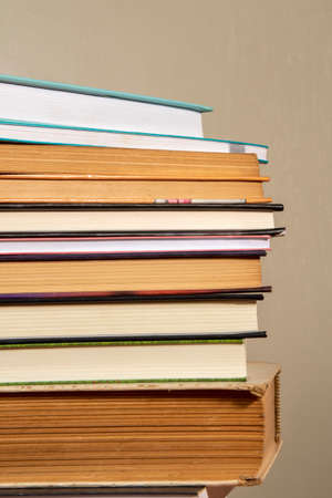 Close-up of background stack of old used books. Pile of vintage old books. Back to school. copy spaceの写真素材