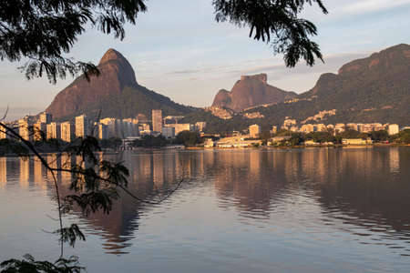 View of Rodrigo de Freitas Lagoon at dawn with Dois Irmao Hill and Pedra da Gavea in the backgroundの写真素材
