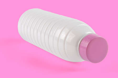 tumbled white plastic yogurt bottle isolatedの写真素材