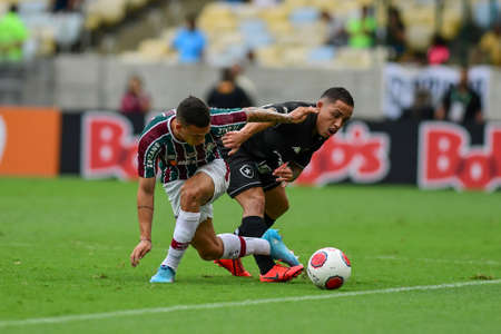 Rio, Brazil - March 27, 2022: Andre and Rikelmi player in match between Fluminense vs Botafogo by semifinal round of Carioca Championship in Maracana Stadiumのeditorial素材