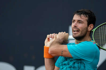 Rio, Brazil - February 13, 2022: Juan Ignacio Londero (ARG) plays against Roberto Carballes Baena (ESP) in qualifying round match at Rio Open 2022 at Jockey Club Arena, ATP 500 tournamentのeditorial素材