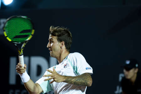 Rio, Brazil - February 14, 2022: Felipe Meligeni Alves (BRA) plays against Miomir Kecmanovic (SRB) in first round match at Rio Open 2022 at Jockey Club Arena, ATP 500 tournamentのeditorial素材