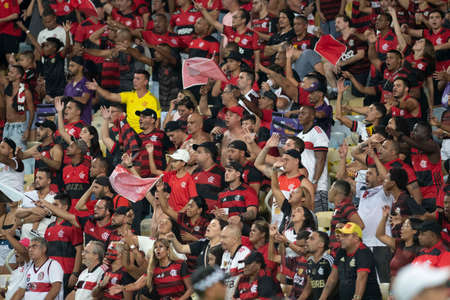 Rio, Brazil - March 30, 2022: Fans in match between Flamengo vs Botafogo by first match of final round of Carioca Championship in Maracana Stadiumのeditorial素材
