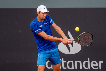 Rio, Brazil - February 13, 2022: Daniel Elahi Galan (COL) plays against [WC] Matheus Pucinelli de Almeida (BRA) in qualifying round match at Rio Open 2022 at Jockey Club Arena, ATP 500 tournamentのeditorial素材