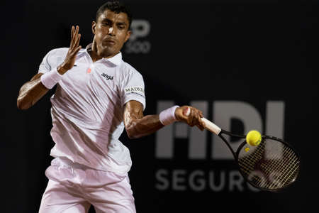 Rio, Brazil - February 15, 2022: Thiago Monteiro (BRA) plays against Sebastian Baez (ARG) in match at Rio Open 2022 at Jockey Club Arena, ATP 500 tournamentのeditorial素材