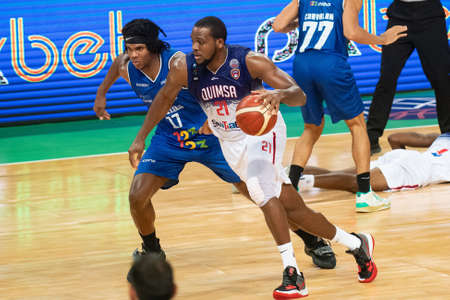 Rio, Brazil - April 09, 2022: Eric Lawon ANDERSON JR and Tavario Miller player in match between Minas vs Quinsa by third place of final round of Basketball Champions League America in Arena Carioca 1 Stadiumのeditorial素材