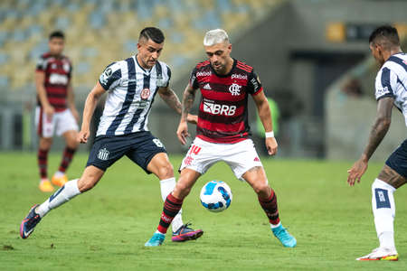 Rio, Brazil - April 12, 2022: De Arrascaeta and Mendez player in match between Flamengo (BRA) vs Talleres (ARG) by Libertadores Cup 2022, by round of groups, in Maracana Stadiumのeditorial素材