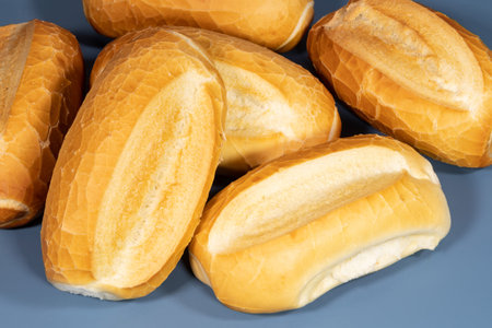 French bread, traditional Brazilian bread in a blue background