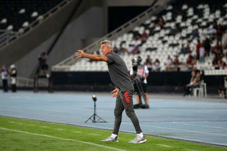 Rio, Brazil - February 23, 2022: Paulo Souza coach in match between Botafogo 1 vs 3 Flamengo by 8th round of Carioca Championship (Taca Guanabara) in Nilton Santos Stadiumのeditorial素材
