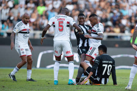 Rio, Brazil - June 16, 2022: Vinicius Lopes and Arboleda player in match between Botafogo vs Sao Paulo by 12th round of Brazilian Championship in Nilton Santos Stadiumのeditorial素材
