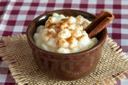 Brazilian sweet dessert, Canjica. White corn porridge with cinnamon and coconut. Consumed at June partiesの写真素材