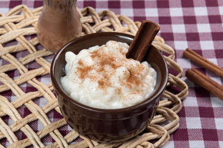 Brazilian sweet dessert, Canjica. White corn porridge with cinnamon and coconut. Consumed at June partiesの写真素材
