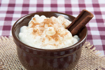 Brazilian sweet dessert, Canjica. White corn porridge with cinnamon and coconut. Consumed at June partiesの写真素材