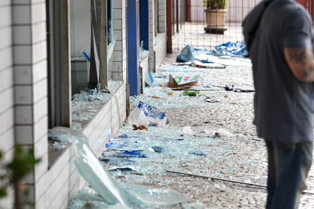 Rio, Brazil - august 03, 2022: Shattered facade after attempted robbery with bank explosion at dawn
